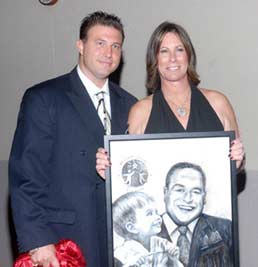 Michael Bell unveiling his celebrity portrait for Eileen de Oliveira and BrightStepsForward